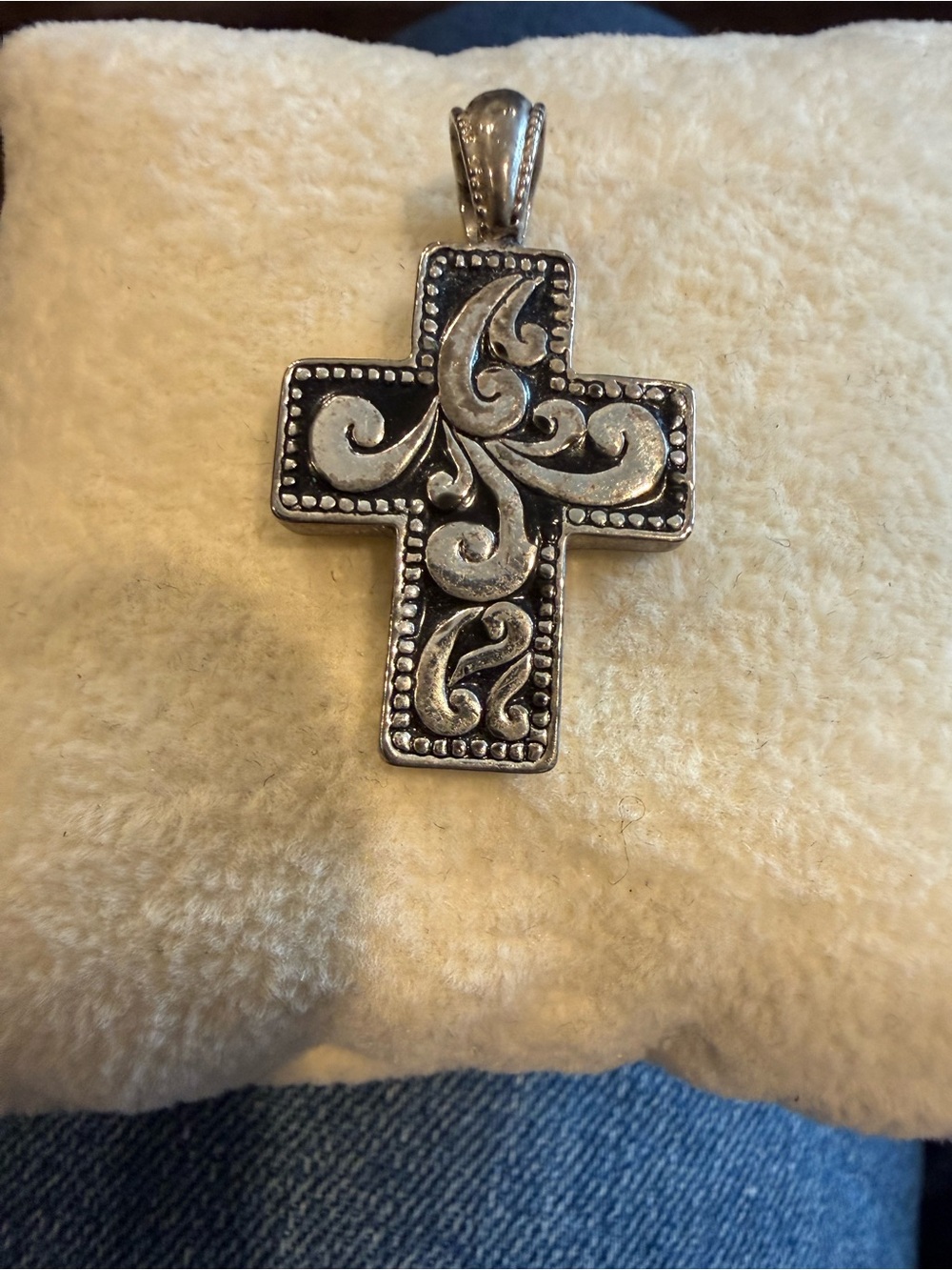 Silver tone and black cross pendent